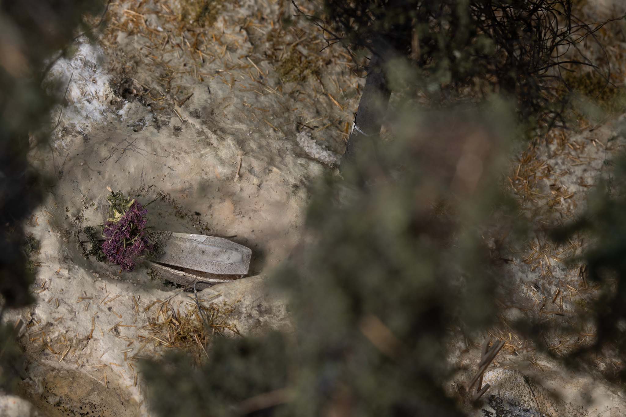 Model of a mass grave site near Izium, Ukraine, by artist Thomas Doyle for the Howard G. Buffett Foundation