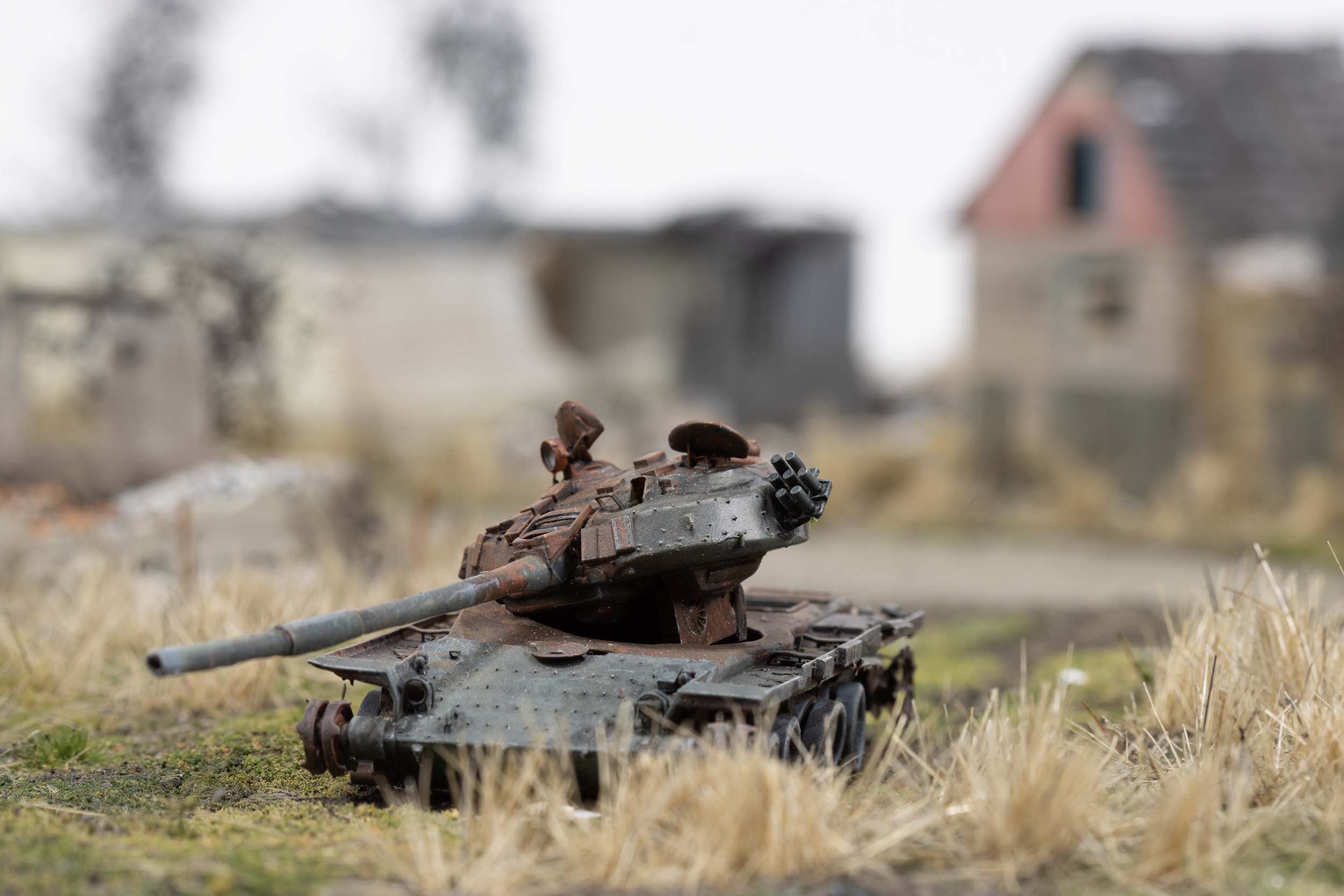 Model of a destroyed Russian tank near homes in the village of Kamianka, Ukraine, by artist Thomas Doyle for the Howard G. Buffett Foundation