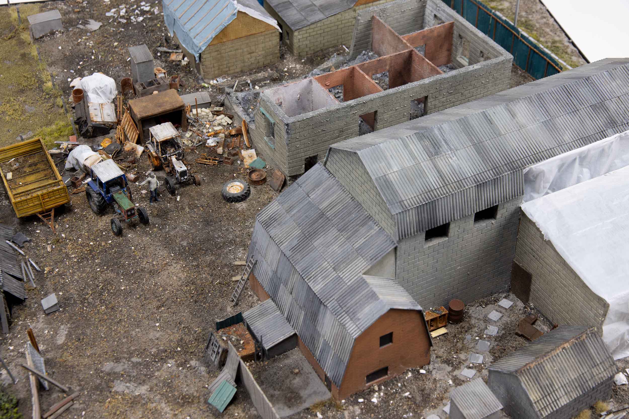 Model of damaged buildings in the village of Kamianka, Ukraine, by artist Thomas Doyle for the Howard G. Buffett Foundation