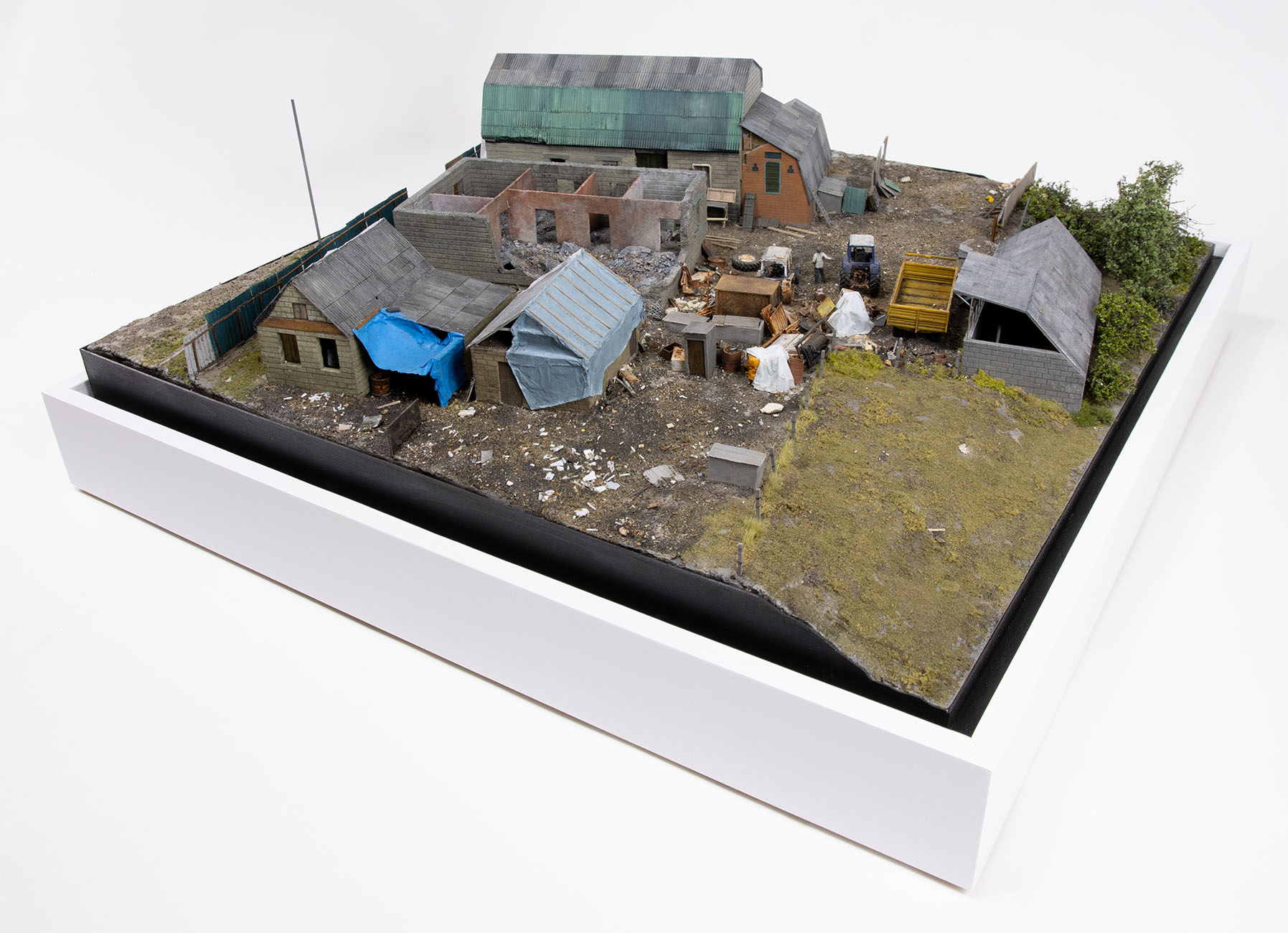 Model of damaged buildings in the village of Kamianka, Ukraine, by artist Thomas Doyle for the Howard G. Buffett Foundation